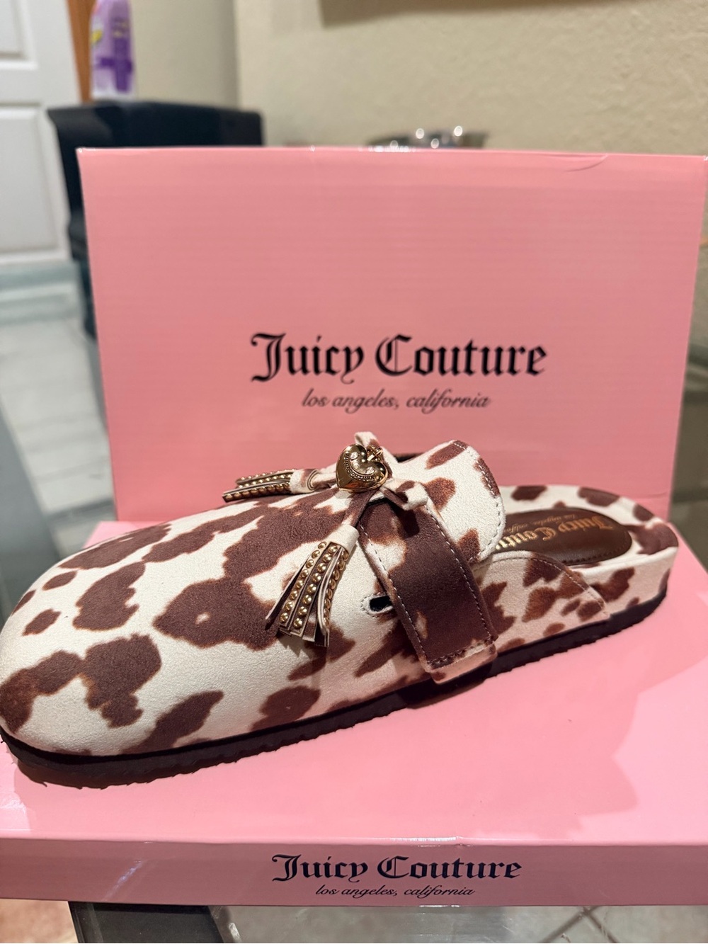 Juicy Couture Brown and Cream Cow-Print Slip-On Mule with Gold Tassels